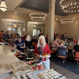 people with food in a room